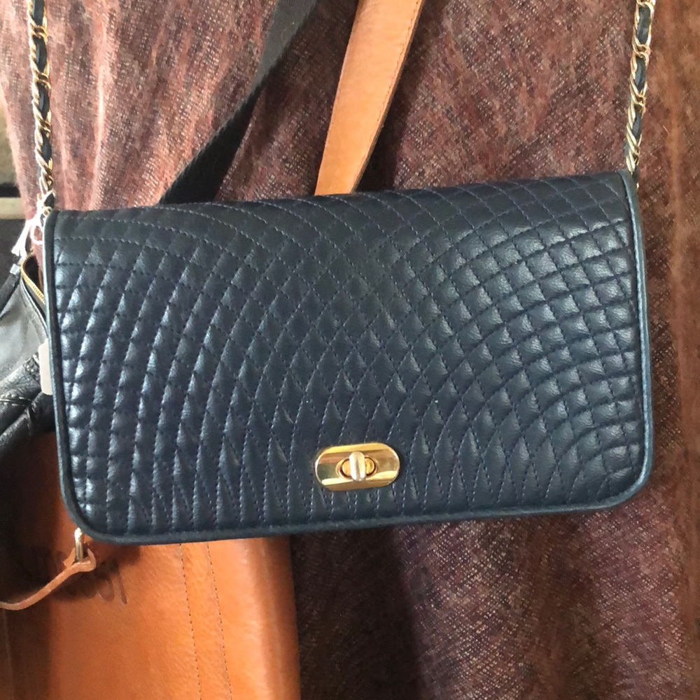Vintage clutch with braided shoulder strap